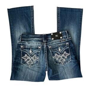 Miss Me Mid Rise Raw Hem Bootcut Jeans